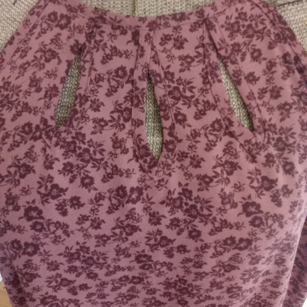 Sleeveless Blouse With Cutout Details